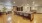 a large dining room with a large table and chairs