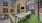 a courtyard with tables and chairs