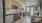 a kitchen with wooden cabinets