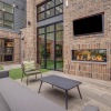 outdoor patio with seating tv and fireplace