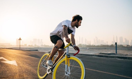 Find your perfect fit at Slate a man riding a bicycle on a road