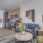 a living room with a couch and a table