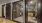 a room with a glass door and a glass wall