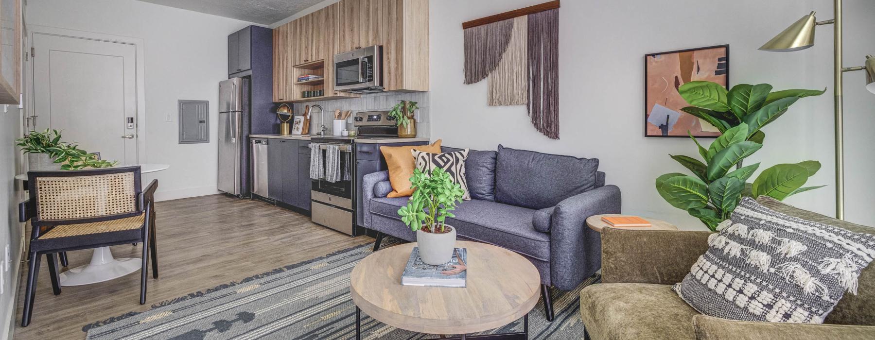 a living room with a couch and a table