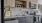 a kitchen with wooden cabinets