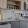 a kitchen with wooden cabinets