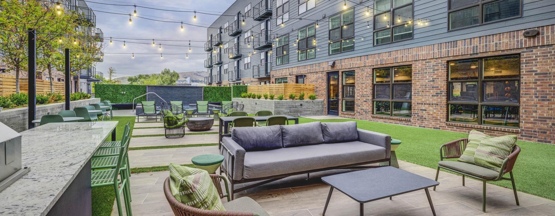 a patio with chairs and tables